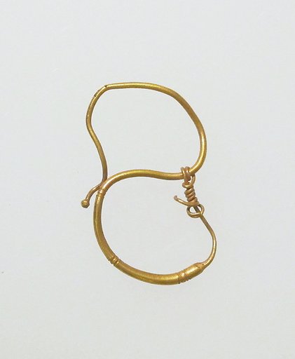 Earring, delta-shaped