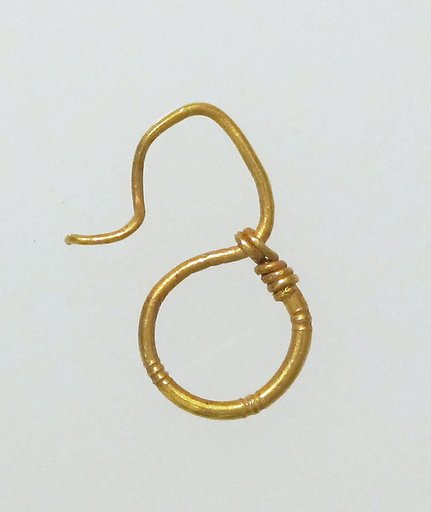 Earring, delta-shaped