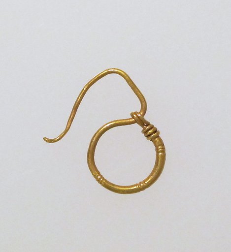 Earring, delta-shaped
