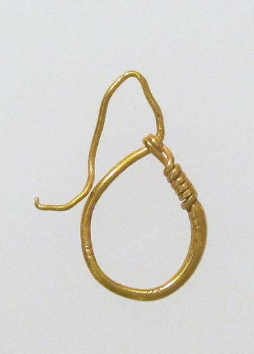 Earring, delta-shaped