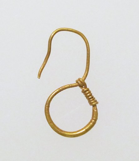 Earring, delta-shaped