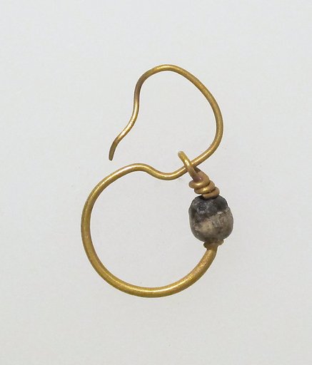 Earring, delta-shaped