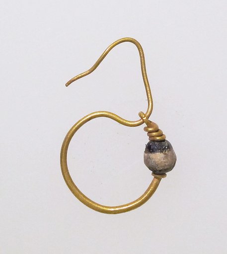 Earring, delta-shaped