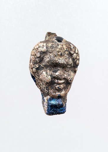 Glass pendant  in the shape of a Black African's head