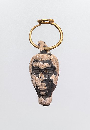 Gold hoop with glass pendant in the form of a youthful head