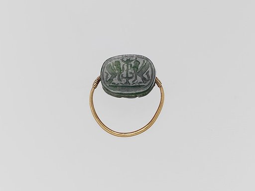 Gold hoop with plasma scarab
