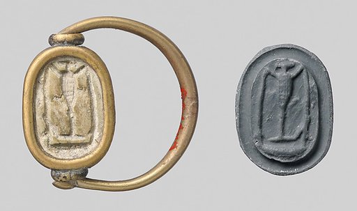 Gold ring with glass scarab