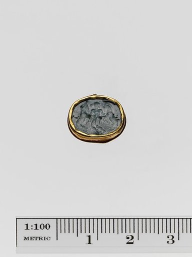 Plasma scaraboid seal set in a gold band