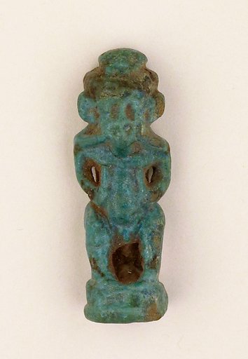 Faience amulet in the form of the dwarf god Pataikos