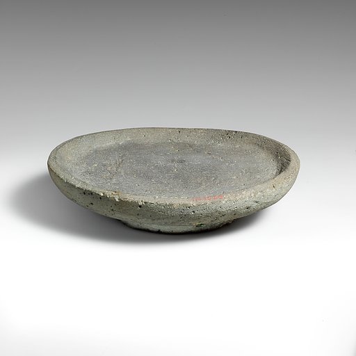 Vesicular basalt mortar or plate
