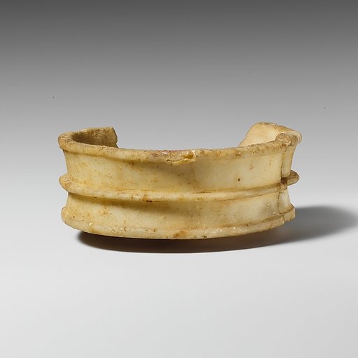 Fragmentary alabaster stemmed bowl