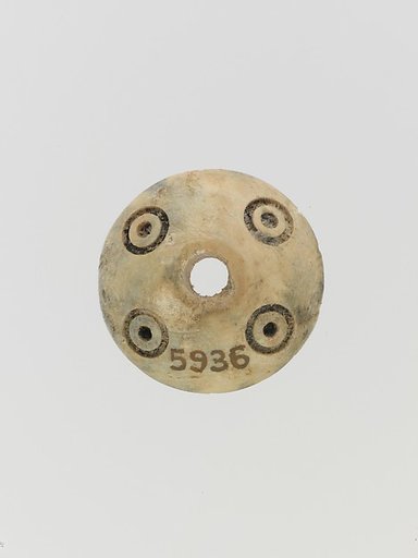 Bone spindle whorl