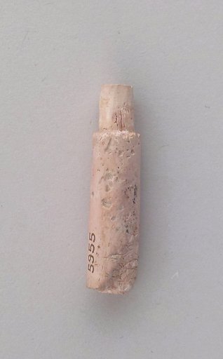 Peg, part of a spindle staff