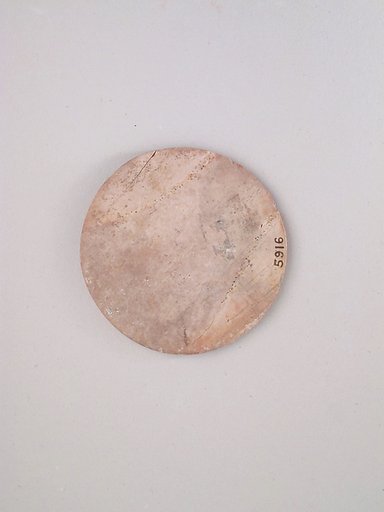 Ivory disk of a pyxis