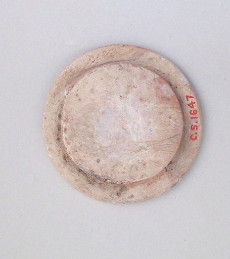 Ivory disk of a pyxis