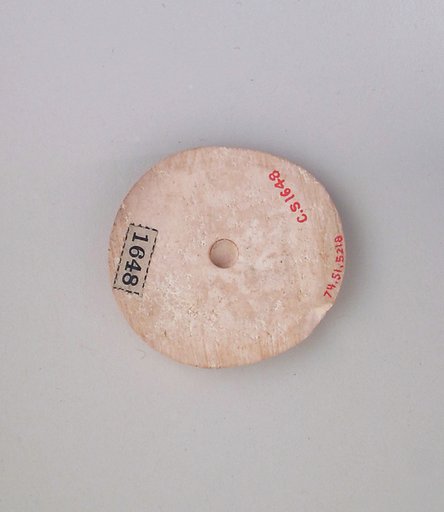Ivory disk of a pyxis with rosette