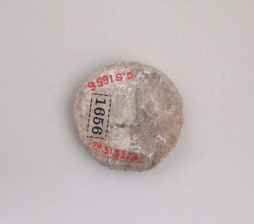 Ivory disk of a pyxis