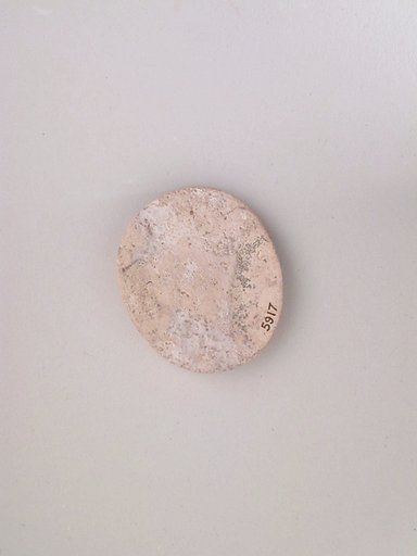 Ivory disk of a pyxis