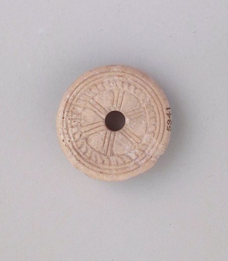 Ivory spindle whorl