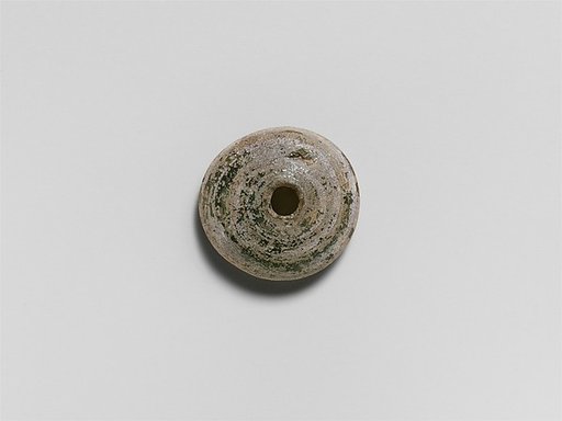 Glass spindle whorl