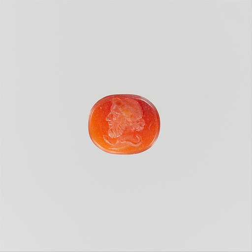 Carnelian ring stone with Asclepius, the god of medicine