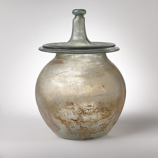 Glass cinerary urn with lid