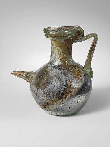 Glass spouted bottle