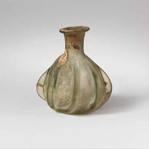 Glass ribbed bottle