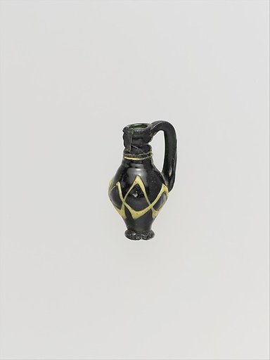 Glass pendant in the form of a miniature jug