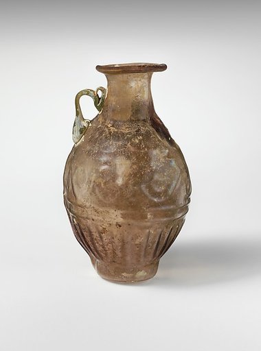 Glass amphoriskos with band of scrolls