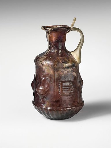 Glass hexagonal jug with Dionysiac symbols