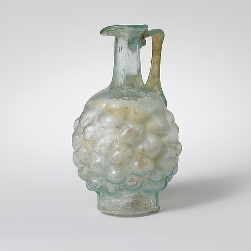 Glass jug in the form of a pine cone