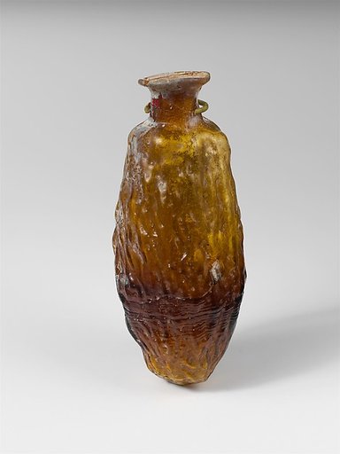 Glass bottle shaped like a date