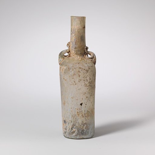 Glass bottle with dolphin handles