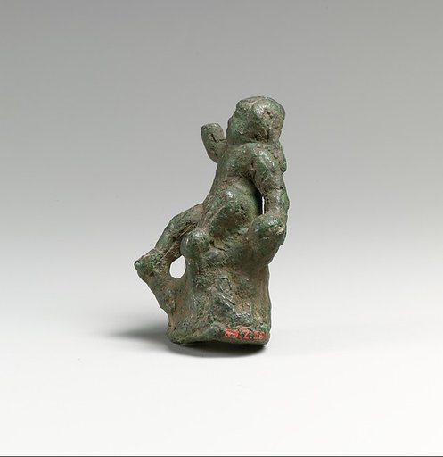 Bronze statuette of Eros seated on a rock