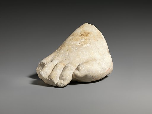 Part of the left foot of a colossal marble statue
