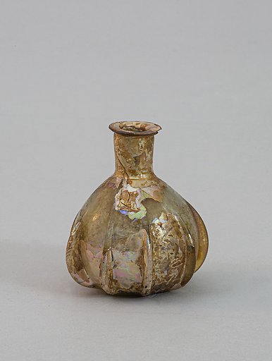 Glass ribbed perfume bottle