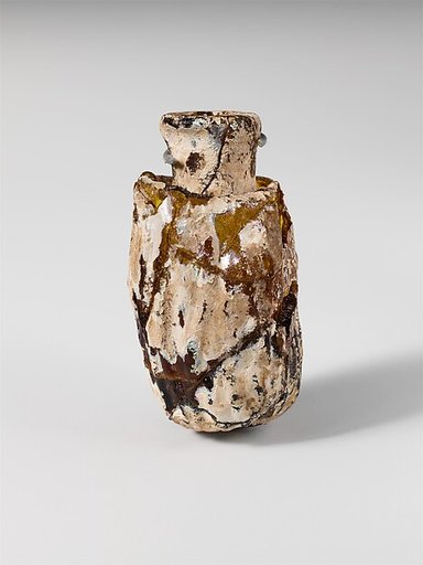 Glass bottle shaped like a date