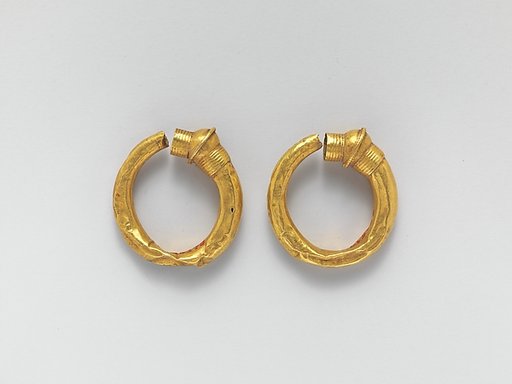 Gold trumpet-shaped earrings