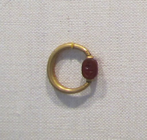 Gold swivel ring with carnelian scarab
