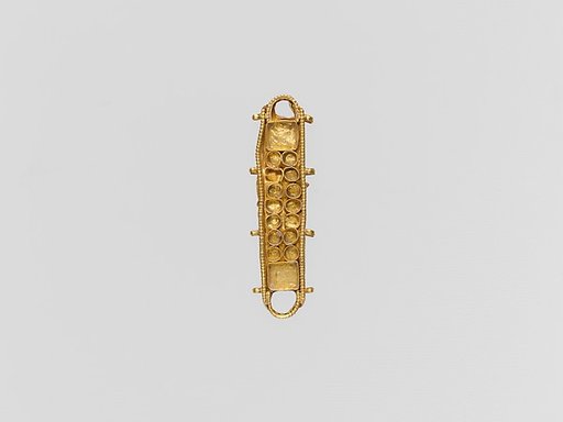 Gold ornament with cloisons