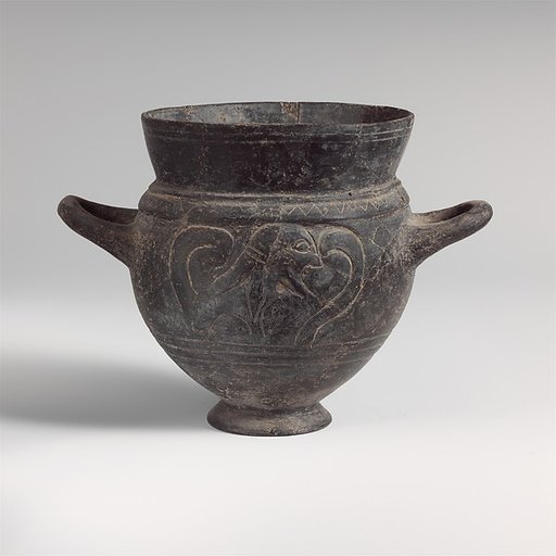 Terracotta drinking cup with two handles