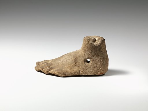 Limestone foot (left) with suspension hole