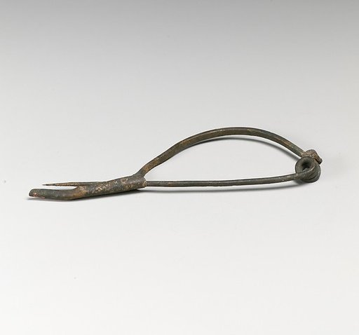 Fibula with bone bead