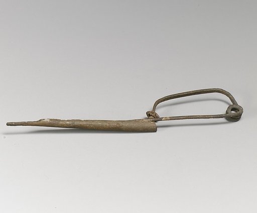 Fibula with silver bead