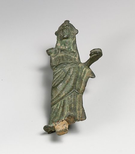Statuette of a woman wearing a mantle over head