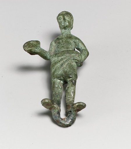 Statuette of a man with patera