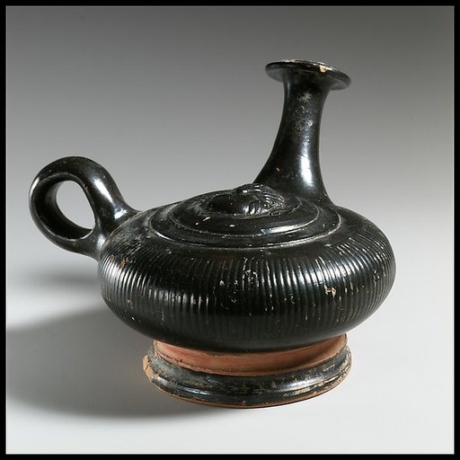 Terracotta guttus (flask with handle and vertical spout)