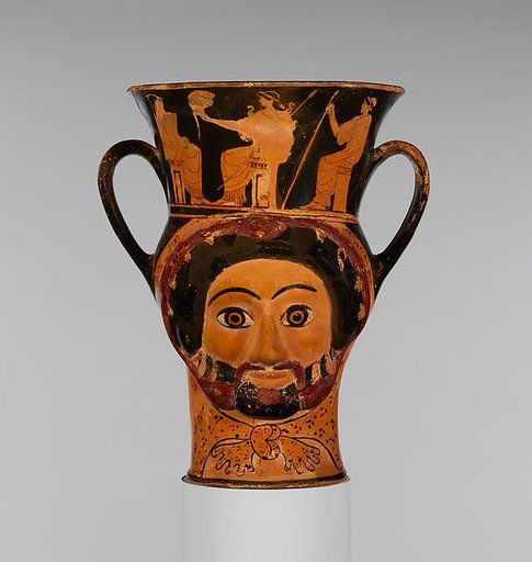 Terracotta kantharos (drinking cup) in the form of the heads of Herakles and of a woman