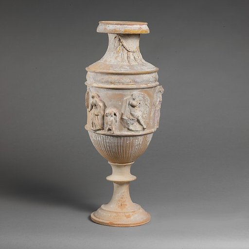 Terracotta vase with relief decoration